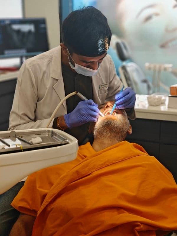 Dr. Pratik Pipalia performing chairside implant treatment