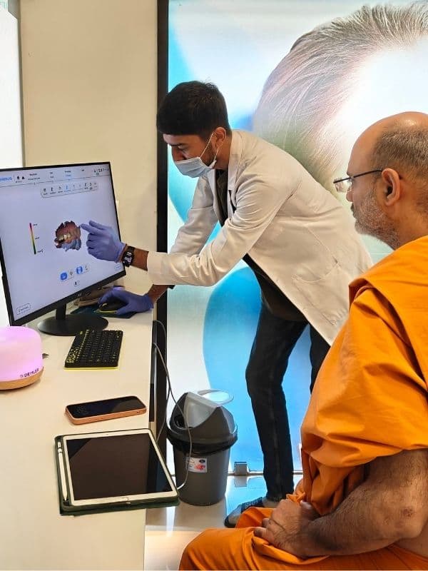 Dr. Pratik Pipalia consulting with a patient